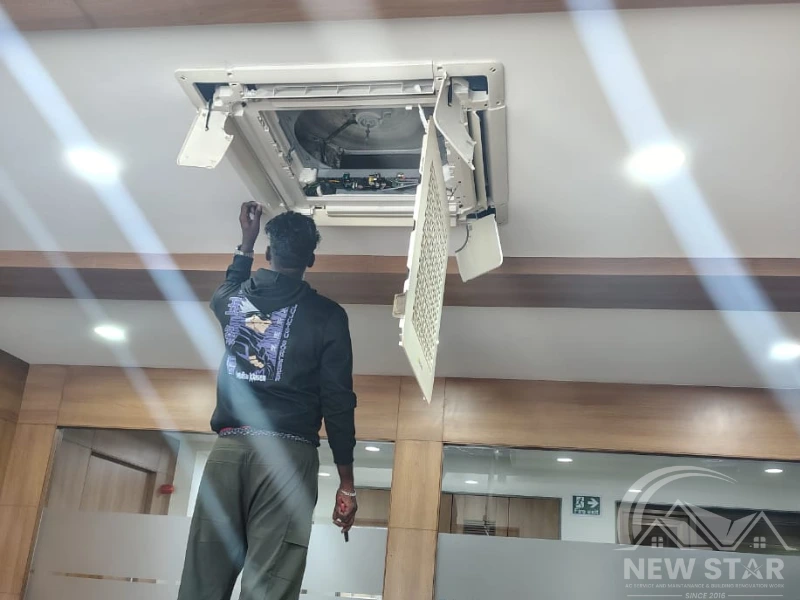 Cassette AC service in Trivandrum by New Star AC Solutions technician cleaning indoor unit
